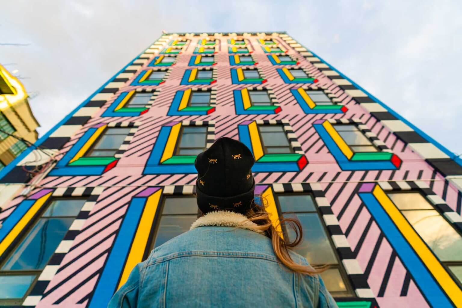 looking up at the mural at Industry City Camille Walala Mural in Brooklyn