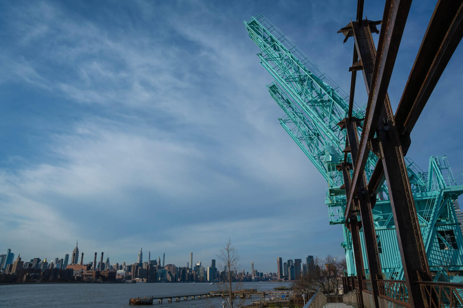 Cranes in Domino Park in Williamsburg Brooklyn along the EAst River with skyline views