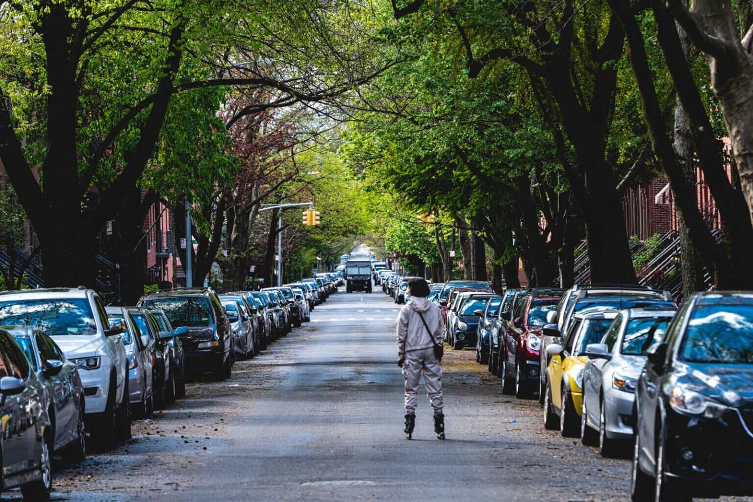 rollerblader down the streets in Park Slope