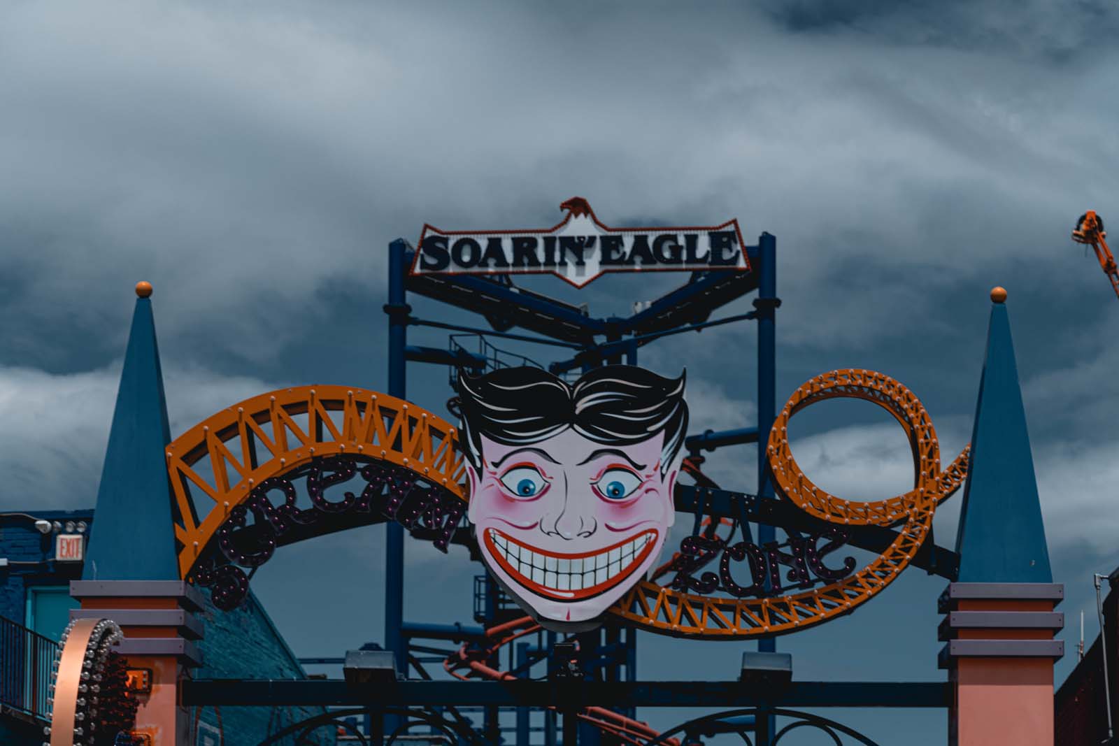 Scream zone sign and rides at Coney Island