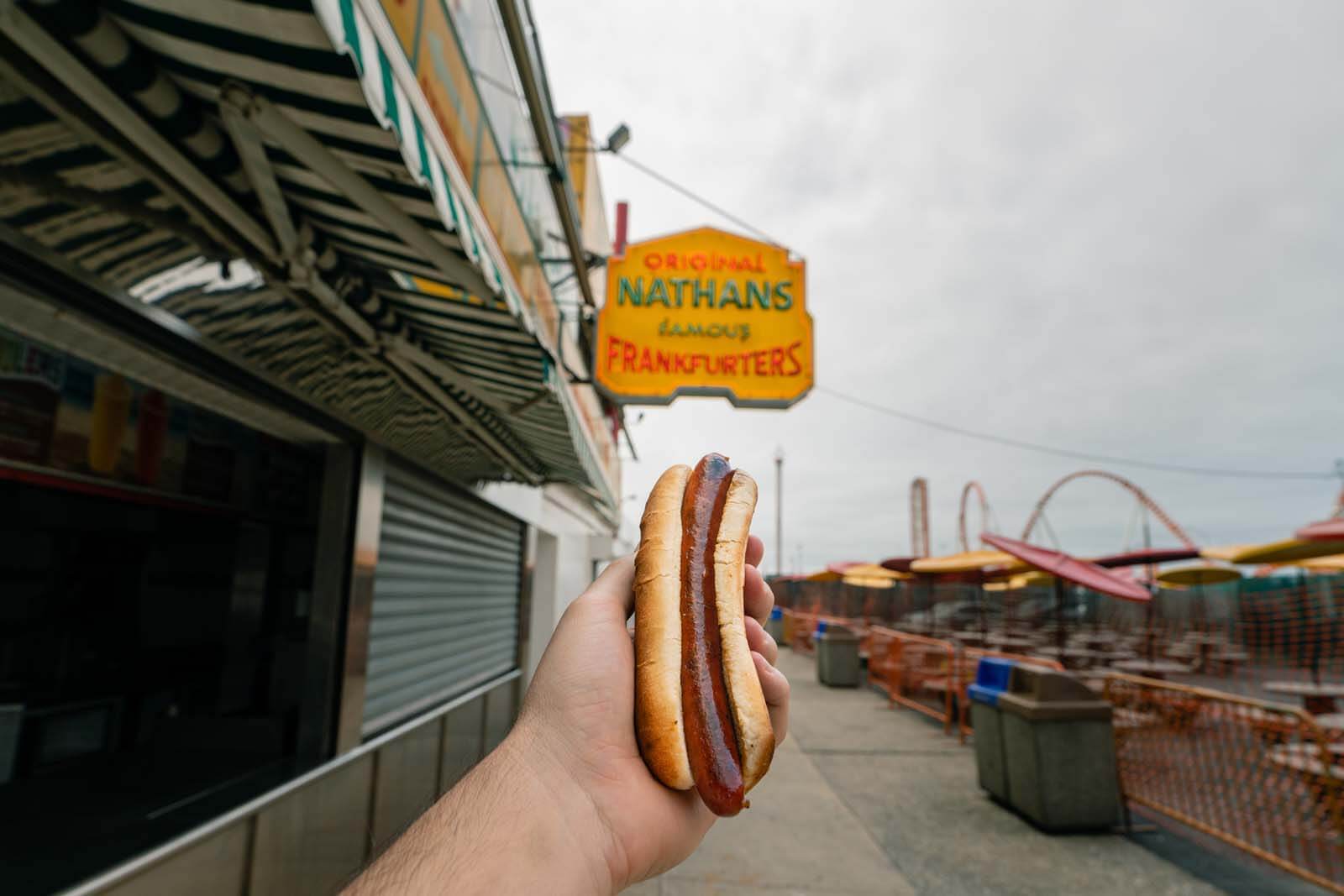 Nathans Famous hot dog in Coney Island Brooklyn iconic Brooklyn food to try!