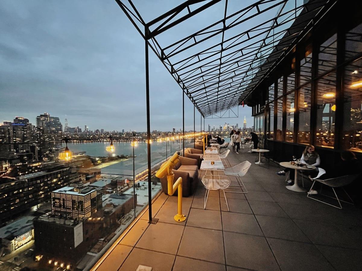 view of the rooftop bar at westlight at the william vale hotel in williamsburg brooklyn