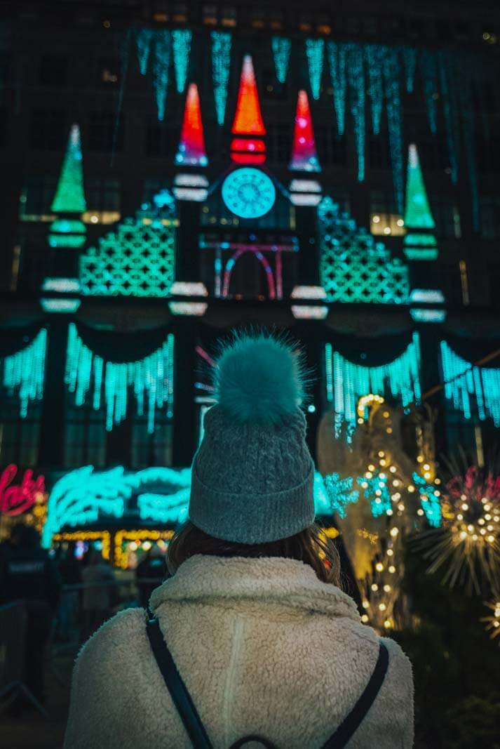 watching the Saks Fifth Avenue light show at Christmas in NYC