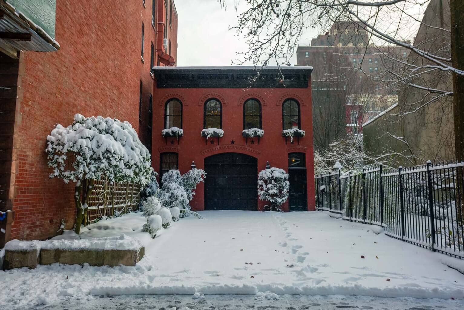 A row house in brooklyn heights covered in snow