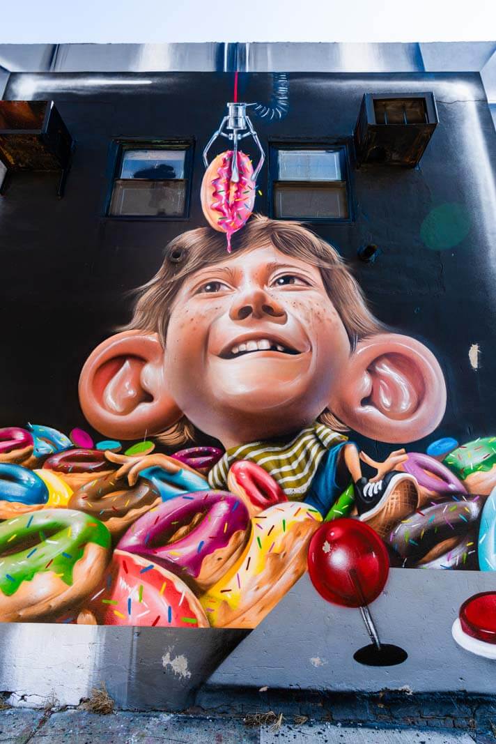 big ear and donut mural at the Bushwick Collective in Brooklyn