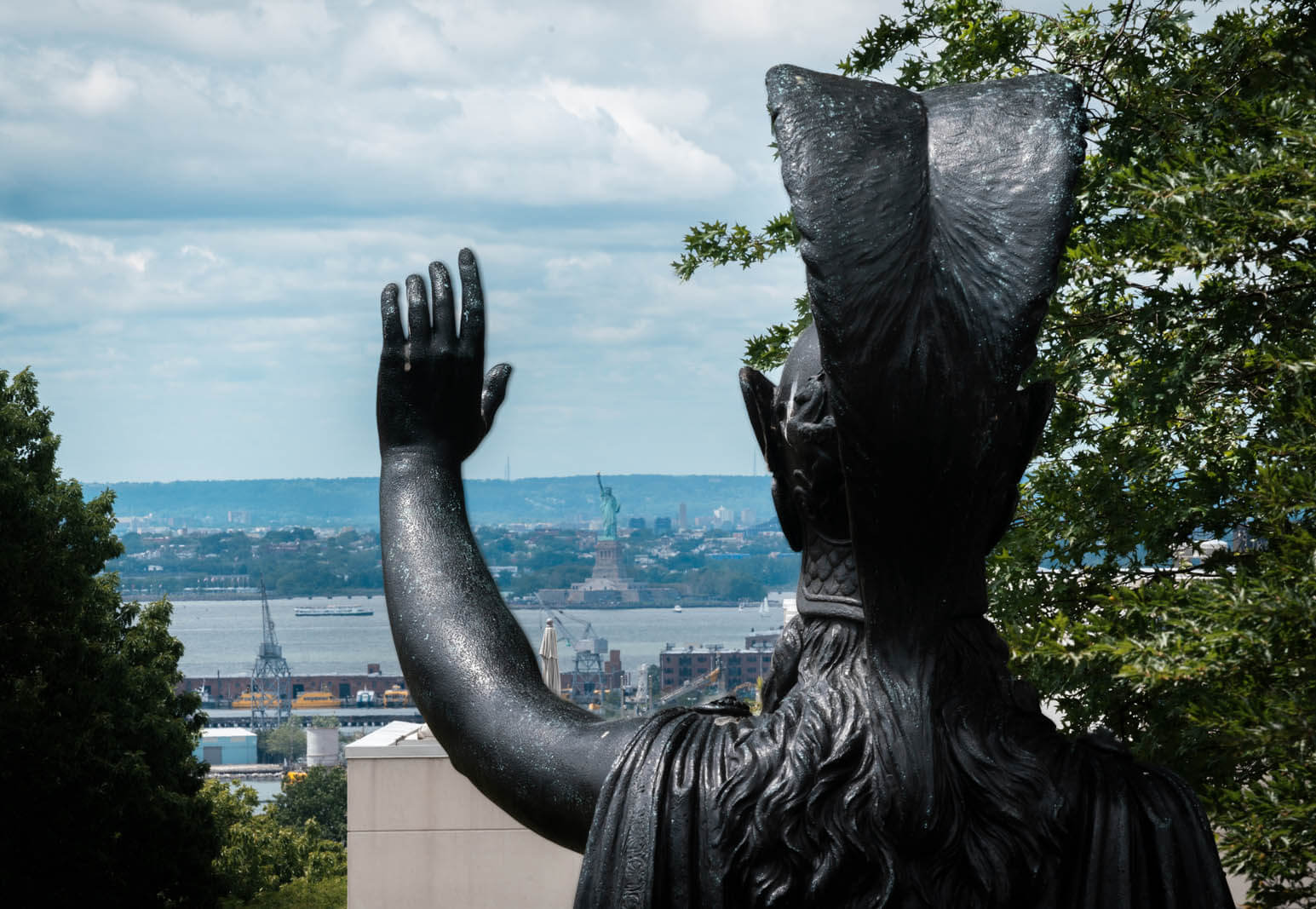 Minerva saluting the Statue of Liberty from Green Wood Cemetery in Sunset Park Brooklyn