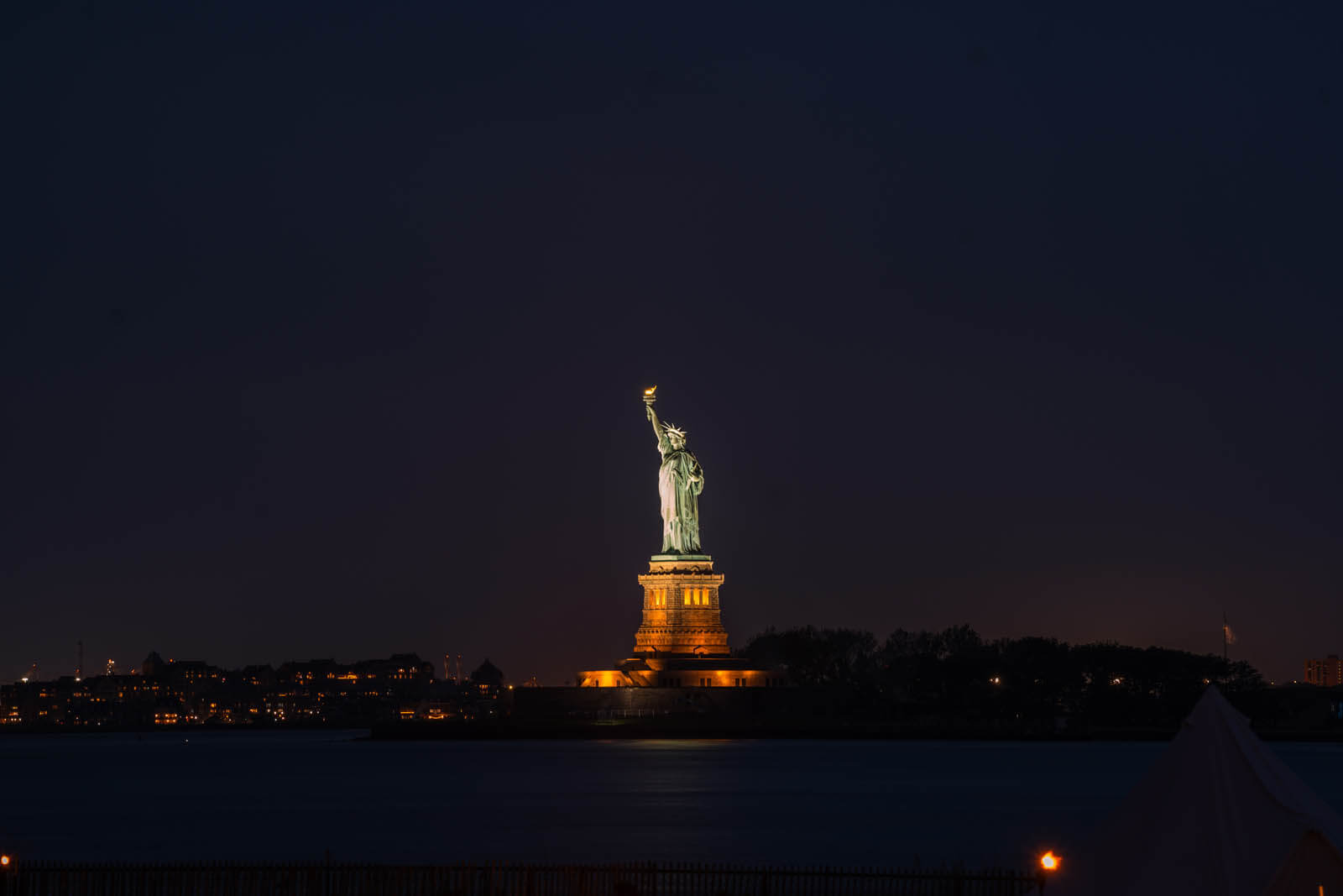 Statue of Liberty at night view from Governors Island