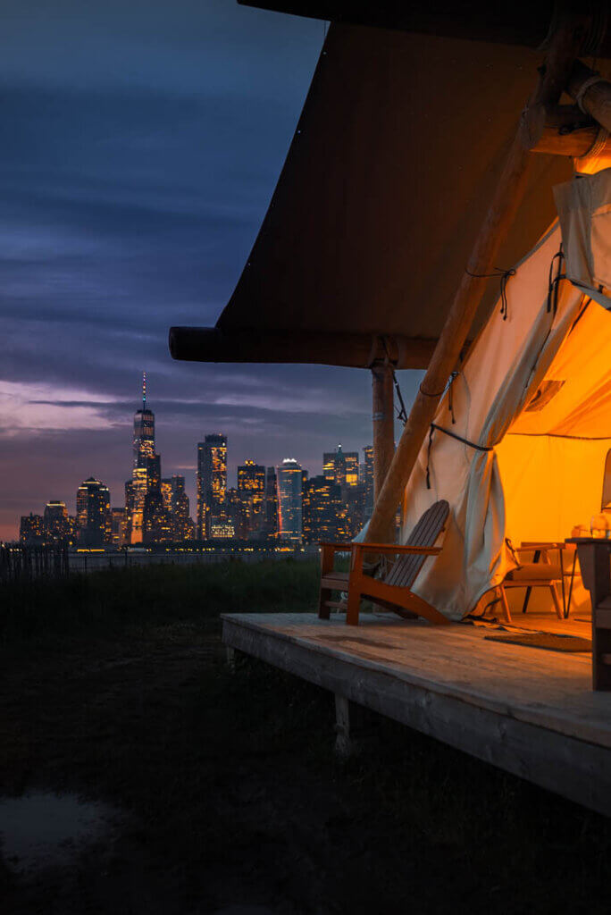 front deck view of the world trade center from glamping at Collective Retreats Governors Island