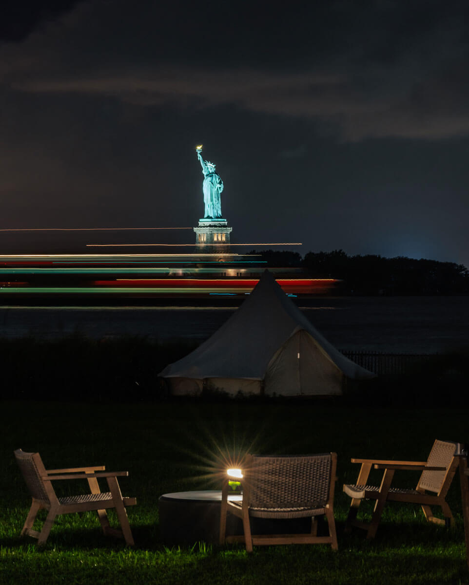 statue-of-liberty-view-from-the-fire-pits-at-Collective-Retreats-on-Governors-Island