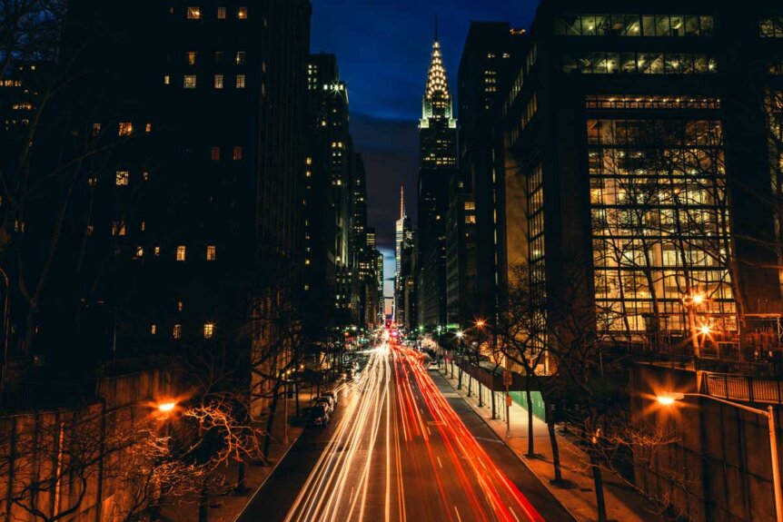 NYC-at-night-with-the-traffic-and-Chrysler-Building-lit-up-