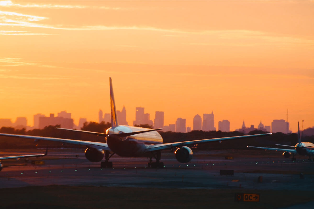 airplane-at-the-airport-at-sunset