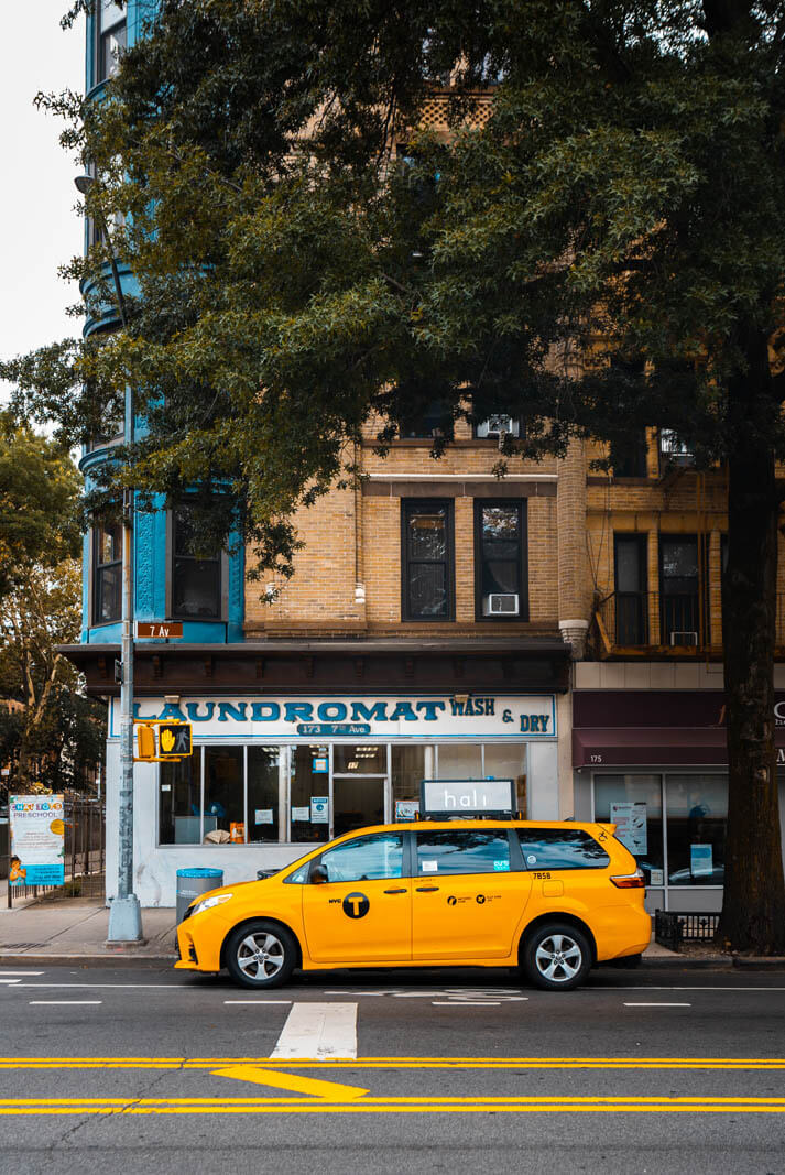 taxi cab and park slope laundromat in Brooklyn