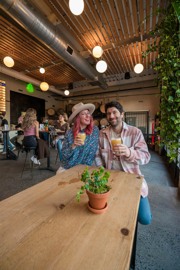 Scott and Megan enjoying a beer at KCBC brewery in bushwick brooklyn