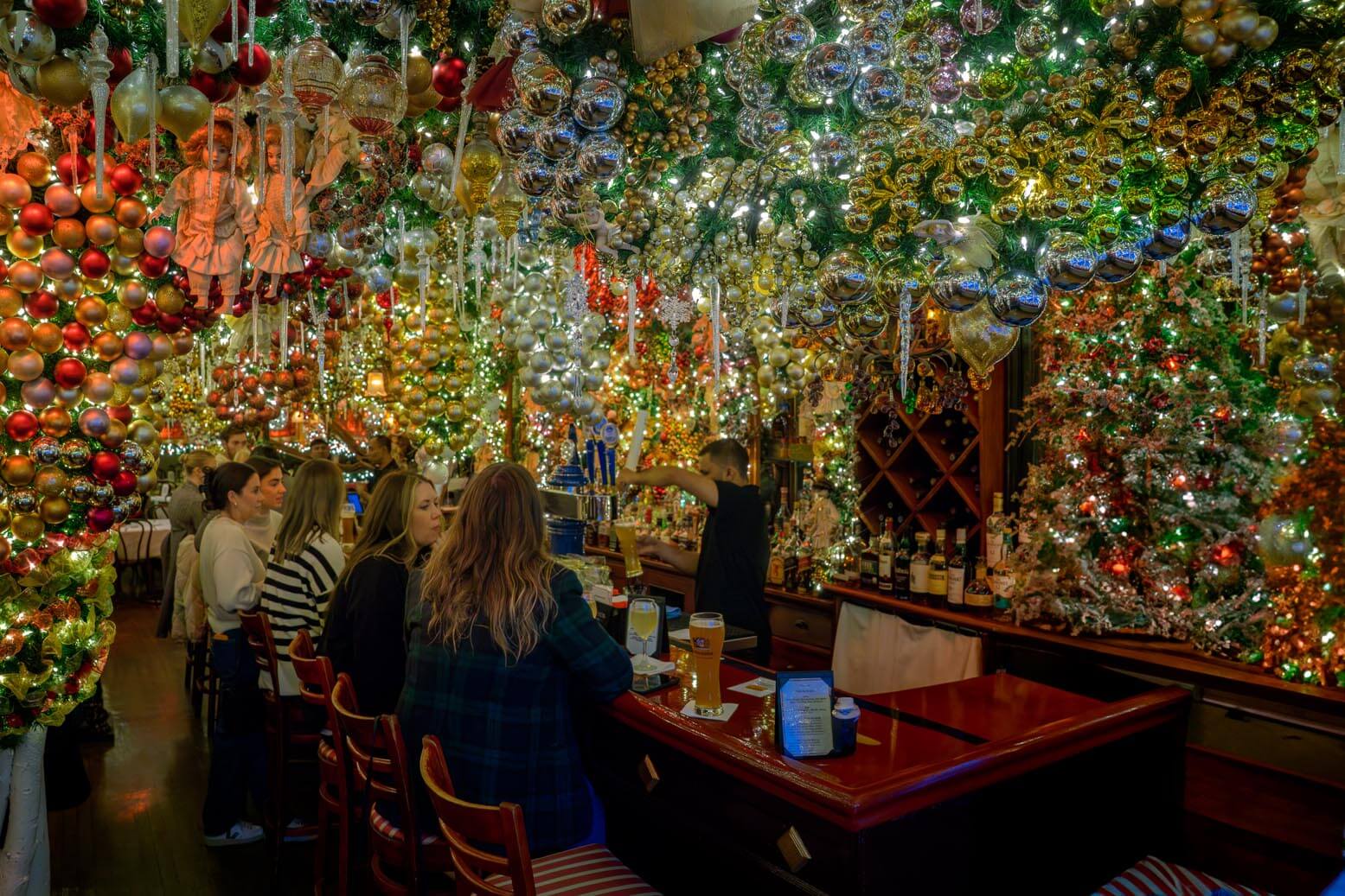 interior of Rolf's German Restaurant with Christmas decorations in New York City Christmas restaurant