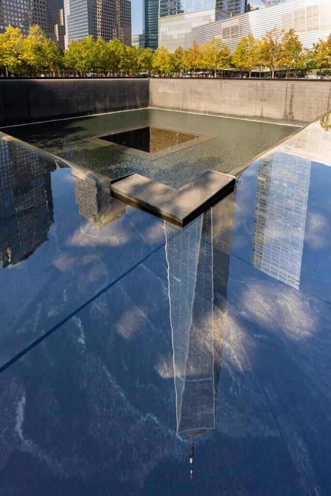 911 memorial pool and reflection of the world trade center in lower manhattan nyc