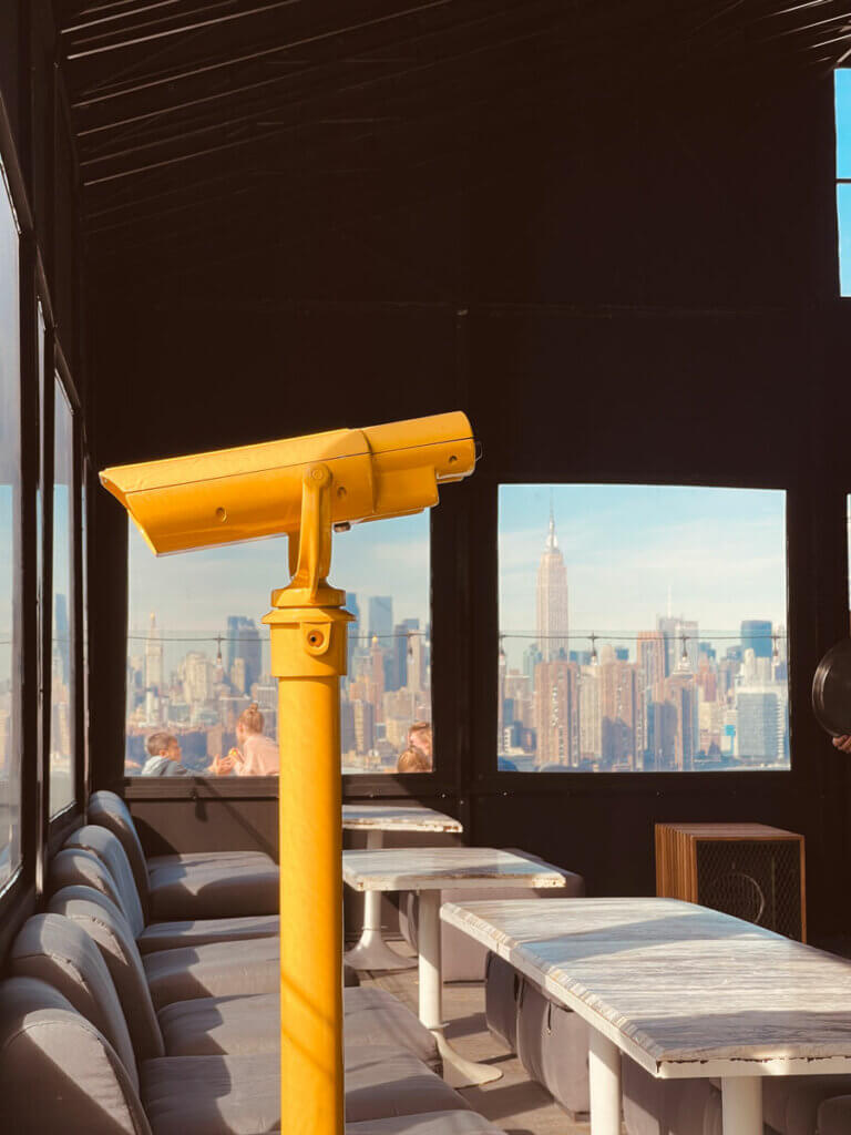 view-of-the-empire-state-building-and-nyc-skyline-from-rooftop-bar-Westlight-in-Williamsburg-Brooklyn