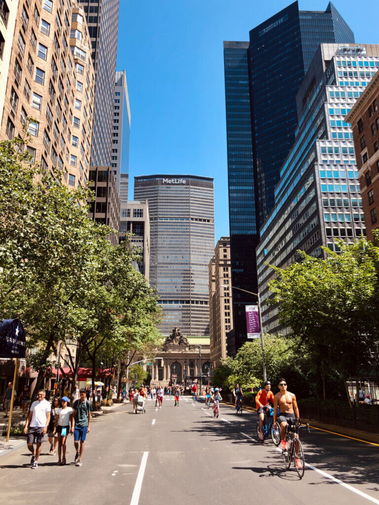 pedestrians-and-cyclists-enjoying-summer-streets-in-nyc-in-august-near-Grand-Central-Terminal