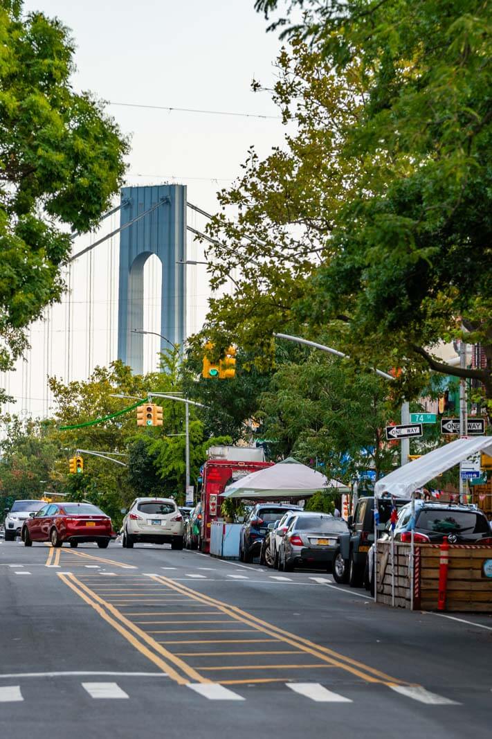 street scene in Bay Ridge Brooklyn with view of the Verrazano Bridge