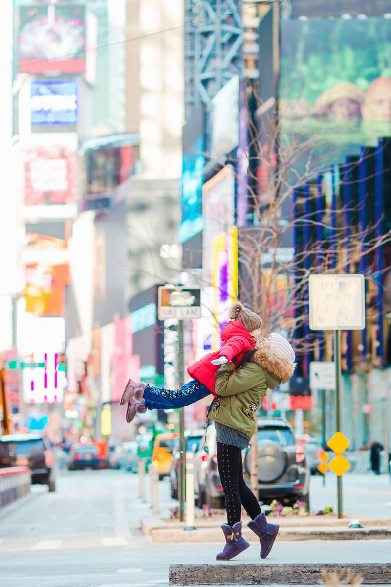 parent-and-child-in-times-square-in-nyc