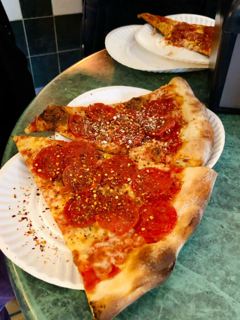 slices-of-pepperoni-pizza-from-Joes-Pizza-in-NYC