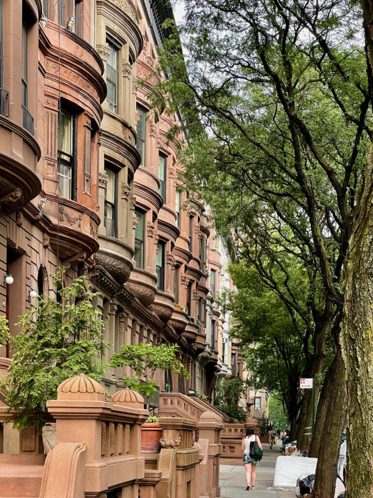 beautiful brownstone lined street in the Upper West Side Manhattan 