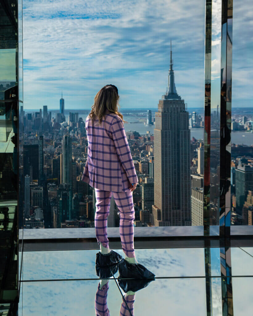looking at the Empire State Building from Summit One Vanderbilt in Midtown Manhattan NYC