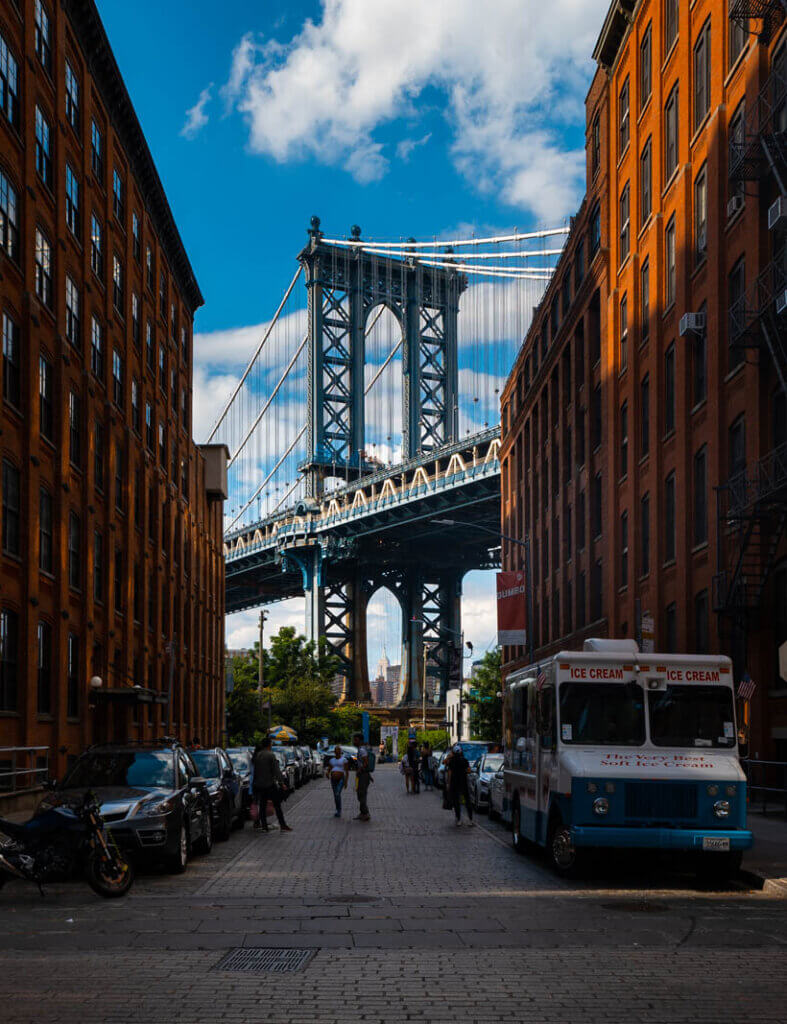 the famous view of Manhattan Bridge from front and water street in DUMBO NYC