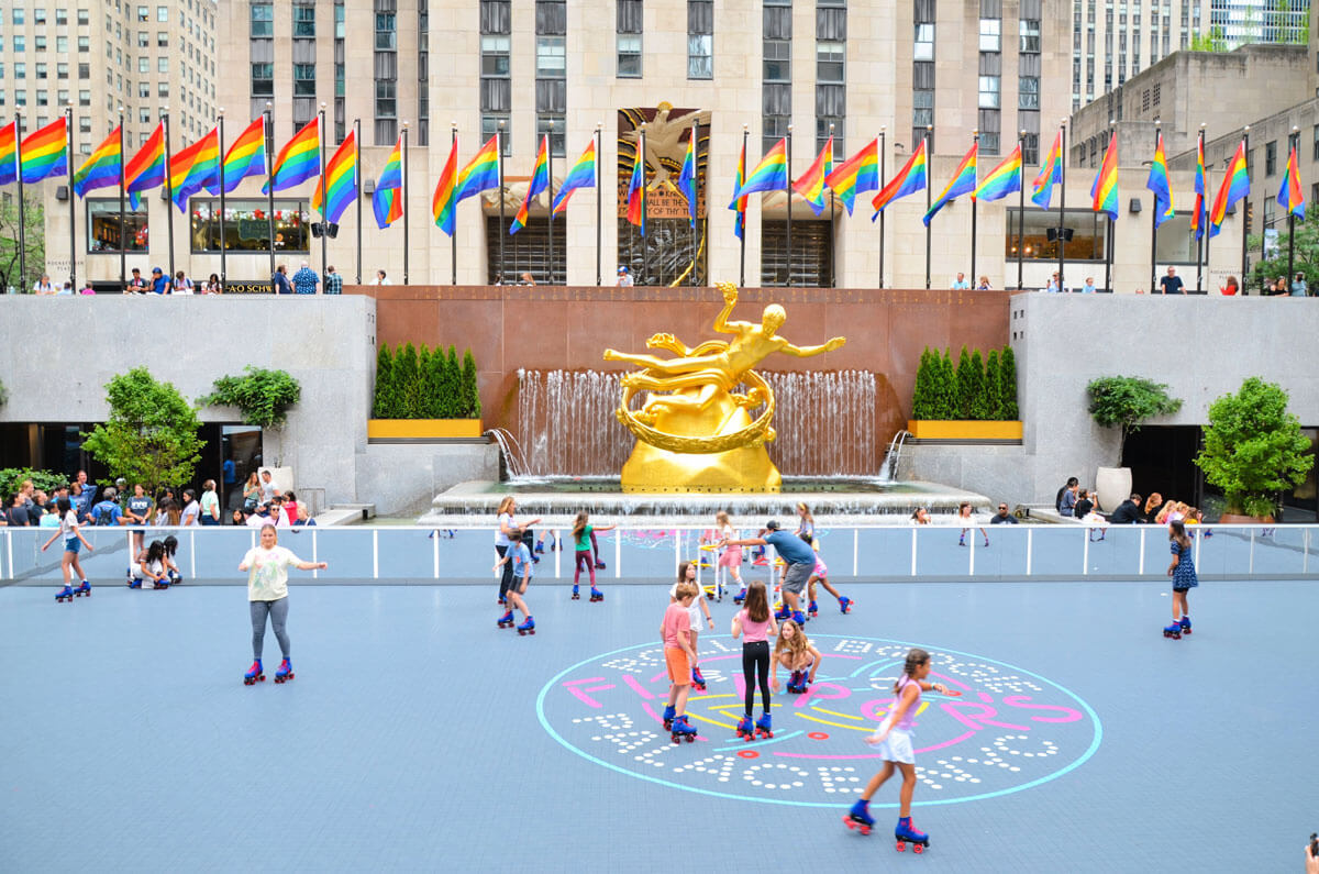 roller-skating-at-the-rink-at-rockefeller-plaza-during-NYC-in-summer