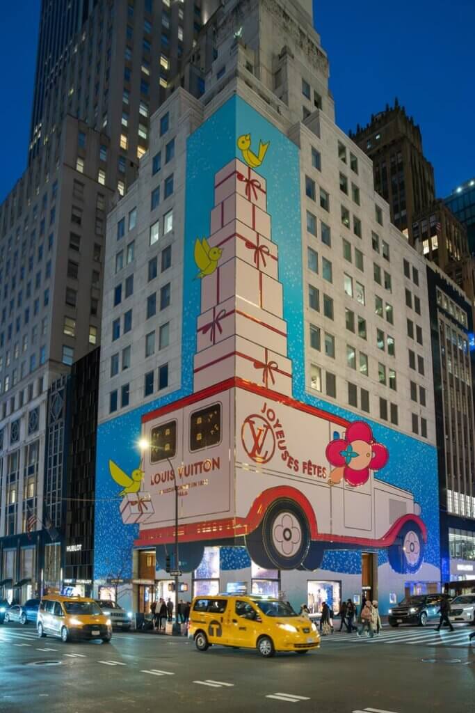 2023 Louis Vuitton Holiday Window Display in NYC with yellow taxi